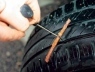 Как починить проколотое колесо
